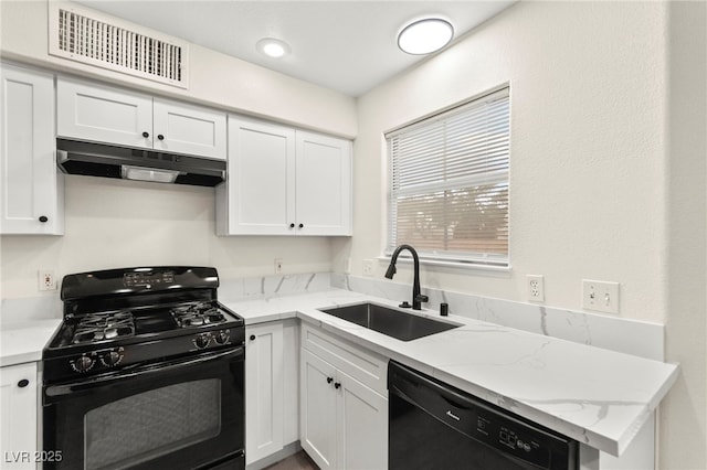 7566 Glowing Ember Ct Unit 101, Las Vegas, NV 89130 - kitchen with black appliances, under cabinet range hood, a sink, white cabinetry, and light stone counters