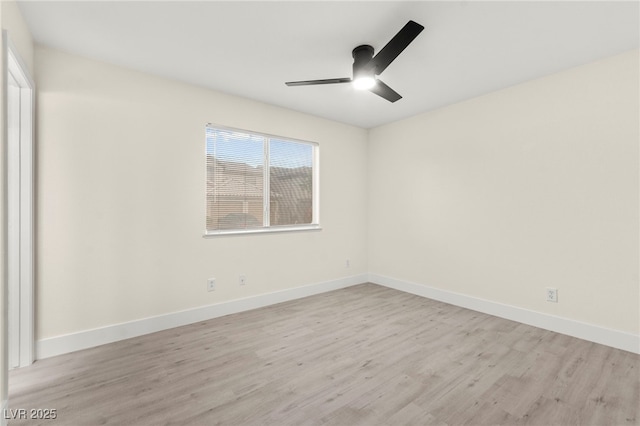 7566 Glowing Ember Ct Unit 101, Las Vegas, NV 89130 - unfurnished room with a ceiling fan, light wood-type flooring, and baseboards
