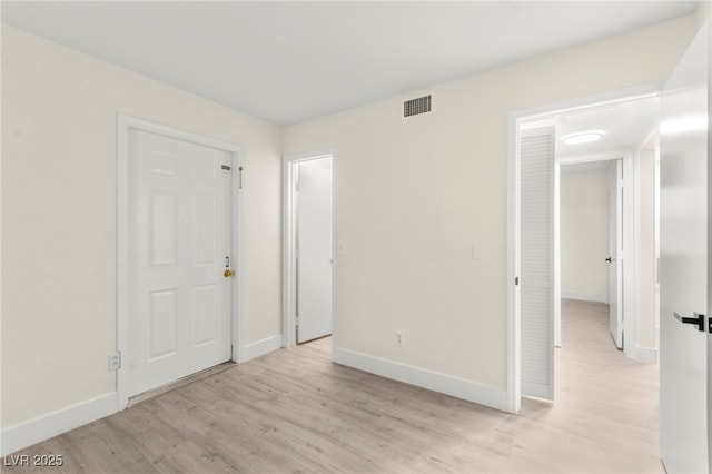 7566 Glowing Ember Ct Unit 101, Las Vegas, NV 89130 - unfurnished room featuring light wood-style flooring and baseboards