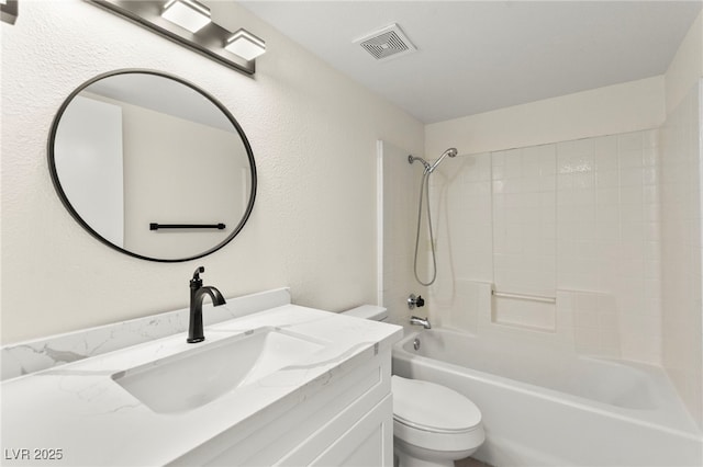 7566 Glowing Ember Ct Unit 101, Las Vegas, NV 89130 - bathroom featuring toilet, vanity, bathing tub / shower combination, and a textured wall