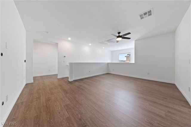 9839 Berkley Brook Ct, Las Vegas, NV 89141 - spare room featuring ceiling fan, wood finished floors, baseboards, and recessed lighting