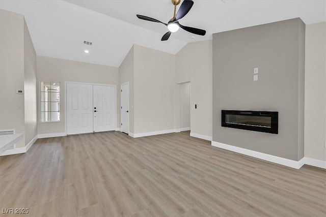 8513 Festival Dr, Las Vegas, NV 89134 - unfurnished living room featuring a ceiling fan, baseboards, light wood-style flooring, high vaulted ceiling, and heating unit