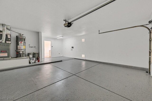 8513 Festival Dr, Las Vegas, NV 89134 - garage featuring water heater, baseboards, a garage door opener, and heating unit