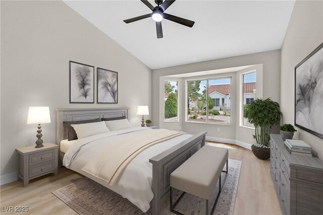 8513 Festival Dr, Las Vegas, NV 89134 - bedroom with light wood finished floors, baseboards, a ceiling fan, and high vaulted ceiling