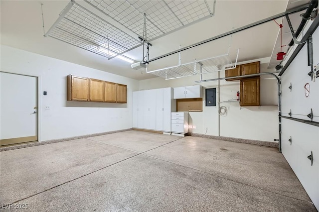 4750 Fiore Bella Blvd, Las Vegas, NV 89135 - garage featuring electric panel and a garage door opener