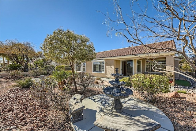 4750 Fiore Bella Blvd, Las Vegas, NV 89135 - view of front facade featuring stucco siding and a tiled roof
