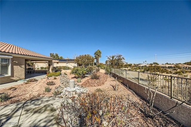 4750 Fiore Bella Blvd, Las Vegas, NV 89135 - fenced backyard with a patio area