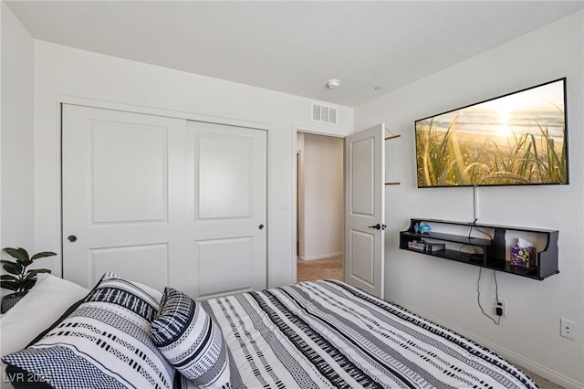 6807 Satin Silver Ct, North Las Vegas, NV 89086 - carpeted bedroom featuring baseboards and a closet