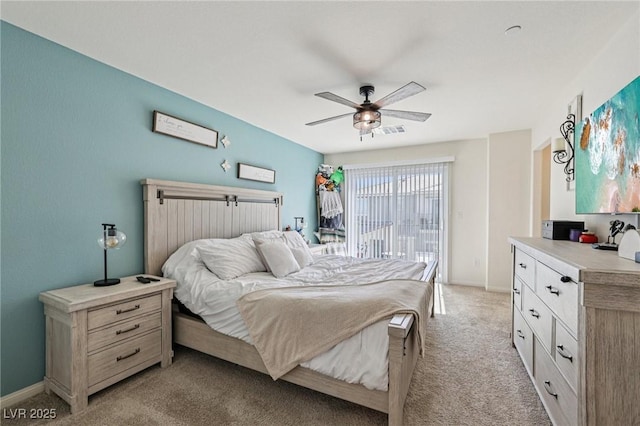 6807 Satin Silver Ct, North Las Vegas, NV 89086 - bedroom with access to exterior, light carpet, ceiling fan, and baseboards