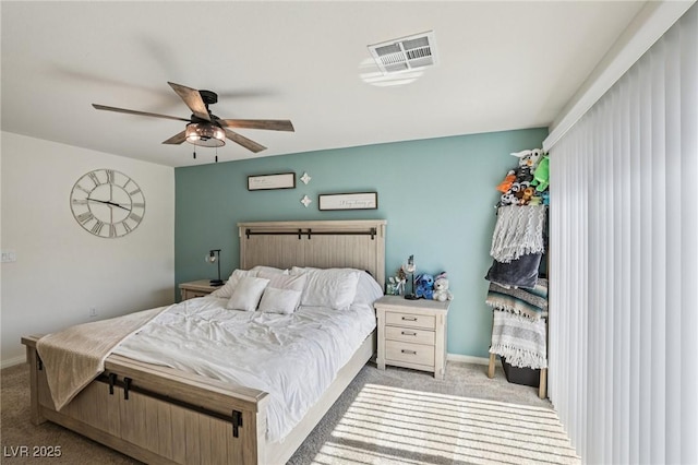 6807 Satin Silver Ct, North Las Vegas, NV 89086 - carpeted bedroom featuring baseboards and ceiling fan
