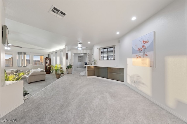 1060 Calico Ridge Dr, Henderson, NV 89011 - unfurnished living room featuring a ceiling fan, carpet flooring, recessed lighting, and lofted ceiling
