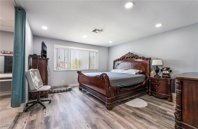 3400 Sioux Way, Las Vegas, NV 89169 - bedroom with wood finished floors, recessed lighting, and baseboards
