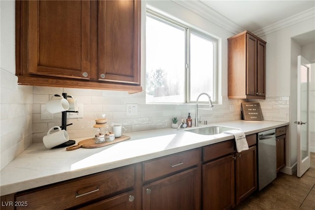 7466 Matilda St, Las Vegas, NV 89113 - kitchen with a sink, stainless steel dishwasher, crown molding, and decorative backsplash