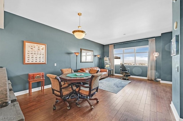 150 Las Vegas Blvd Unit 1004, Las Vegas, NV 89101 - dining space with dark wood-style floors and baseboards