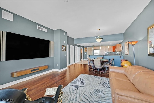 150 Las Vegas Blvd Unit 1004, Las Vegas, NV 89101 - living room with wood finished floors and baseboards