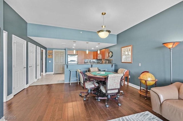 150 Las Vegas Blvd Unit 1004, Las Vegas, NV 89101 - dining space with baseboards and light wood-type flooring