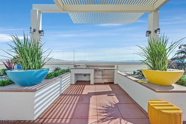 150 Las Vegas Blvd Unit 1004, Las Vegas, NV 89101 - view of patio / terrace with area for grilling and a mountain view
