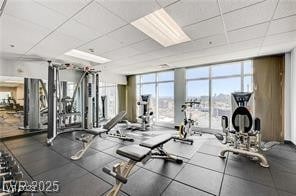 150 Las Vegas Blvd Unit 1004, Las Vegas, NV 89101 - exercise room with floor to ceiling windows and a drop ceiling