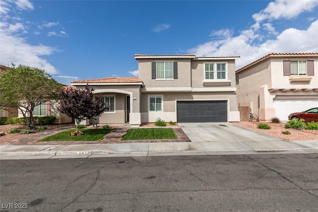 2418 Brockton Way, Henderson, NV 89074 - mediterranean / spanish house with stucco siding, a garage, driveway, and a tile roof
