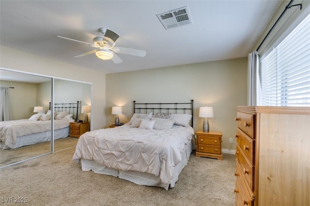 2418 Brockton Way, Henderson, NV 89074 - bedroom with light carpet, a closet, and ceiling fan