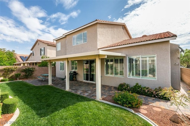 2418 Brockton Way, Henderson, NV 89074 - rear view of property with stucco siding, a patio area, and a tile roof