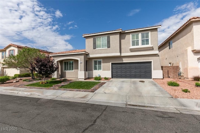 2418 Brockton Way, Henderson, NV 89074 - view of front of property featuring stucco siding, an attached garage, driveway, and a tiled roof
