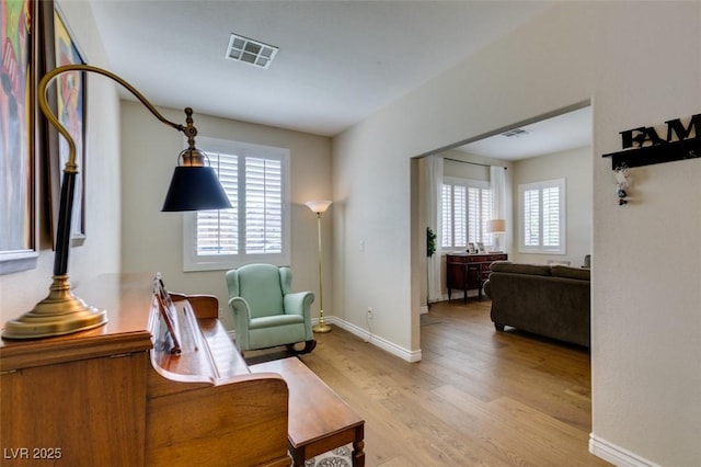2418 Brockton Way, Henderson, NV 89074 - sitting room with light wood finished floors and baseboards