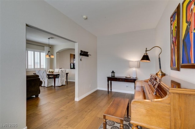 2418 Brockton Way, Henderson, NV 89074 - interior space with wood finished floors and arched walkways