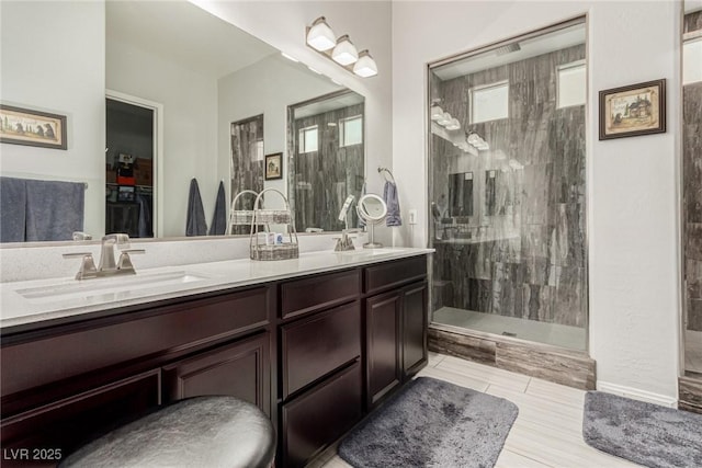 5616 Silver Cascade Ave, Las Vegas, NV 89131 - full bathroom with healthy amount of natural light, a stall shower, and double vanity