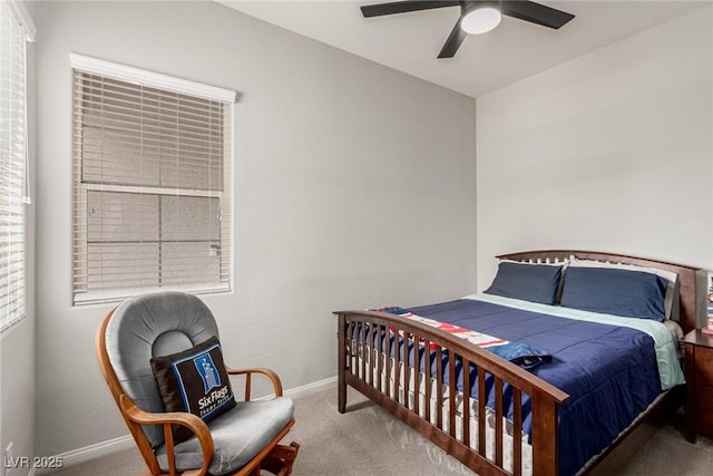 5616 Silver Cascade Ave, Las Vegas, NV 89131 - carpeted bedroom with baseboards and a ceiling fan