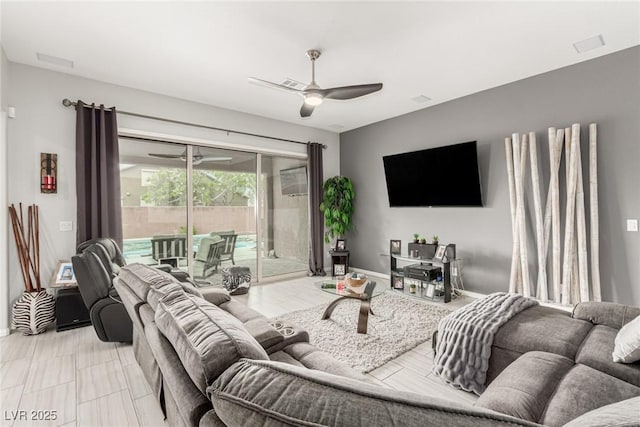 5616 Silver Cascade Ave, Las Vegas, NV 89131 - living room with a ceiling fan and baseboards