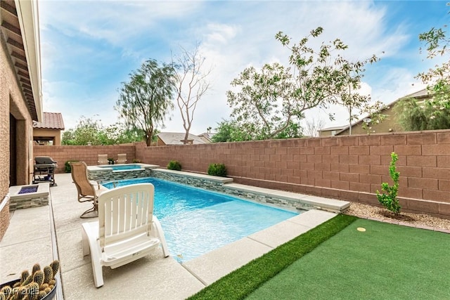 5616 Silver Cascade Ave, Las Vegas, NV 89131 - view of swimming pool with an in-ground hot tub, a fenced backyard, a patio area, and area for grilling