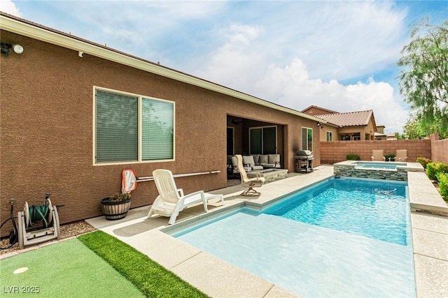 5616 Silver Cascade Ave, Las Vegas, NV 89131 - view of pool featuring a patio area, area for grilling, a fenced backyard, outdoor lounge area, and a pool with connected hot tub