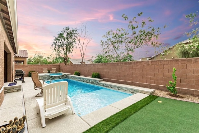 5616 Silver Cascade Ave, Las Vegas, NV 89131 - view of pool with an in-ground hot tub, a fenced backyard, a patio, and area for grilling