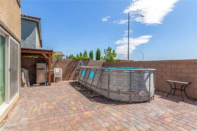 9690 Langden Brook St, Las Vegas, NV 89178 - fenced backyard with a patio