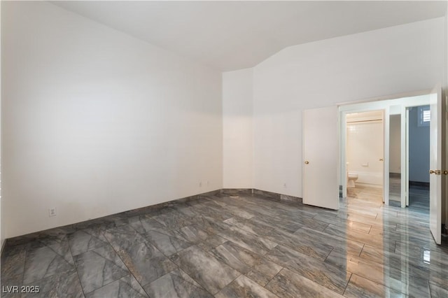 1740 Leaning Pine Way, Las Vegas, NV 89128 - spare room with lofted ceiling