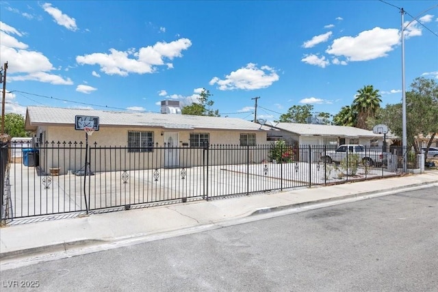 808 Reynolds Ave, North Las Vegas, NV 89030 - single story home with stucco siding and a fenced front yard