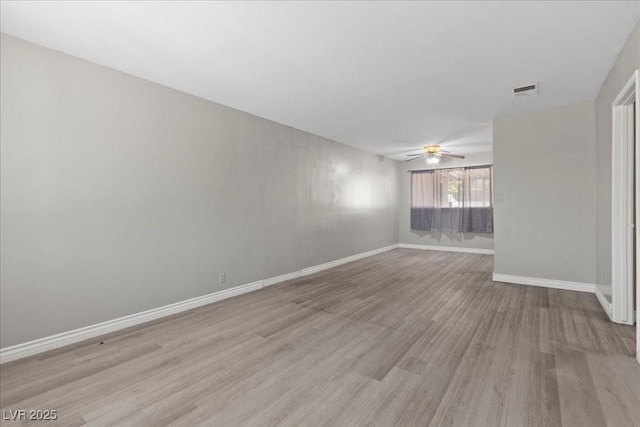 808 Reynolds Ave, North Las Vegas, NV 89030 - spare room featuring ceiling fan, light wood finished floors, and baseboards
