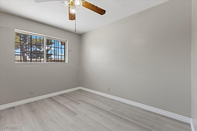808 Reynolds Ave, North Las Vegas, NV 89030 - empty room featuring wood finished floors, a ceiling fan, and baseboards