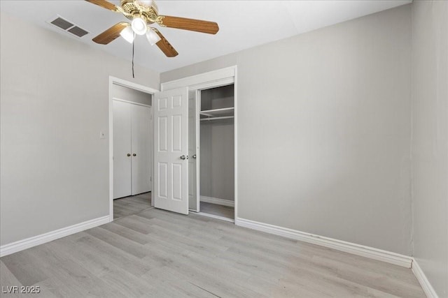 808 Reynolds Ave, North Las Vegas, NV 89030 - unfurnished bedroom featuring baseboards, wood finished floors, and a closet