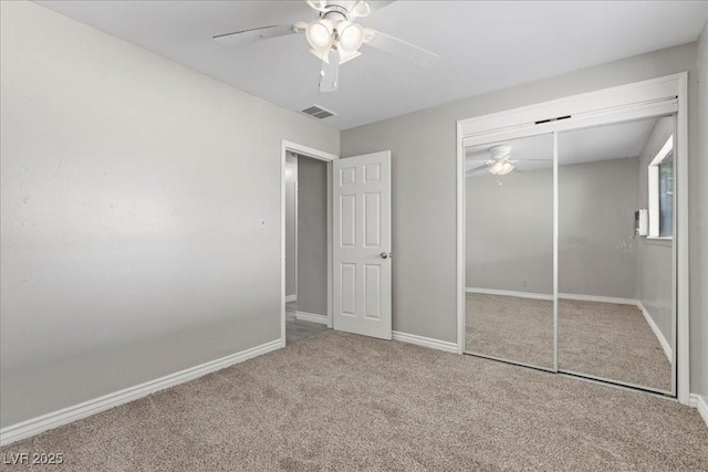 808 Reynolds Ave, North Las Vegas, NV 89030 - unfurnished bedroom featuring carpet, baseboards, a closet, and a ceiling fan