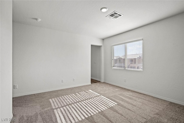 4245 Gold Desert St, North Las Vegas, NV 89032 - carpeted spare room with baseboards and a smoke detector
