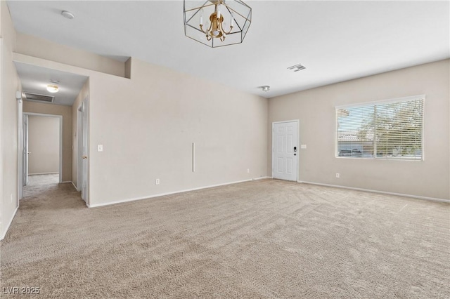 5307 Wild Orchid St, North Las Vegas, NV 89031 - carpeted empty room with baseboards, a chandelier, and a smoke detector