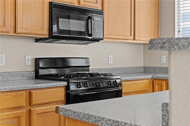 5307 Wild Orchid St, North Las Vegas, NV 89031 - kitchen with black appliances and light countertops