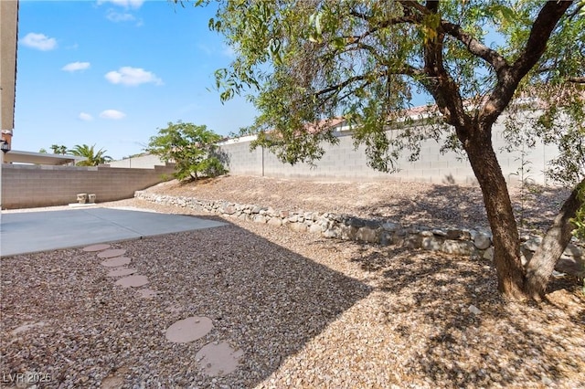 5307 Wild Orchid St, North Las Vegas, NV 89031 - fenced backyard featuring a patio