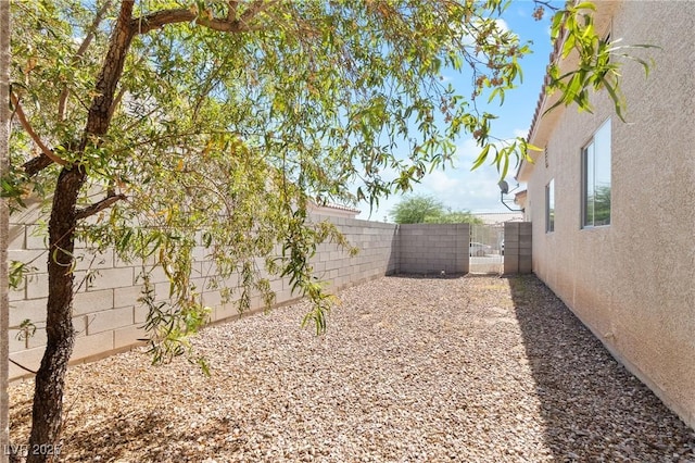 5307 Wild Orchid St, North Las Vegas, NV 89031 - fenced backyard with a gate