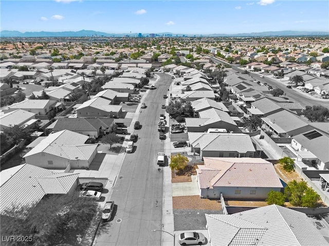 5307 Wild Orchid St, North Las Vegas, NV 89031 - aerial perspective of suburban area featuring mountains