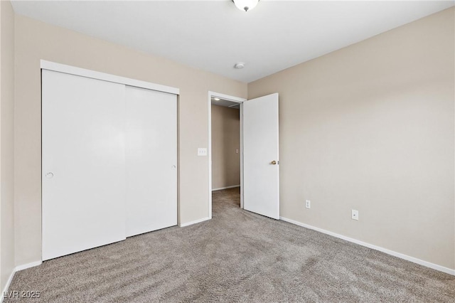 5307 Wild Orchid St, North Las Vegas, NV 89031 - unfurnished bedroom featuring carpet flooring, a closet, and baseboards