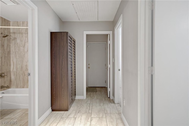 1219 Heather Oaks Way N, Las Vegas, NV 89031 - hallway featuring attic access and baseboards