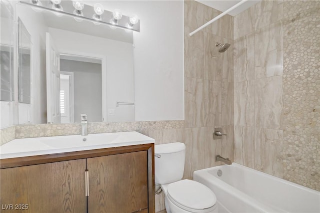 1219 Heather Oaks Way N, Las Vegas, NV 89031 - bathroom featuring toilet, vanity, shower / bathtub combination, tile walls, and wainscoting